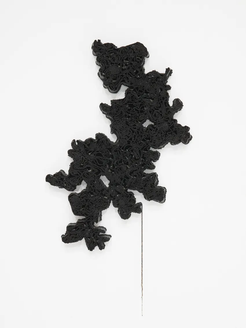 Simphiwe Buthelezi, Ntuthu (2026), a black beaded form resembling a continent