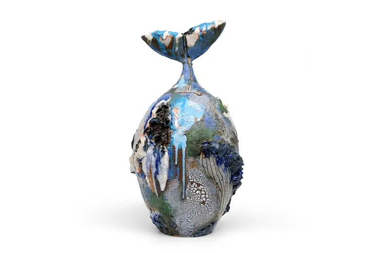 A whale jar with an encrusted surface