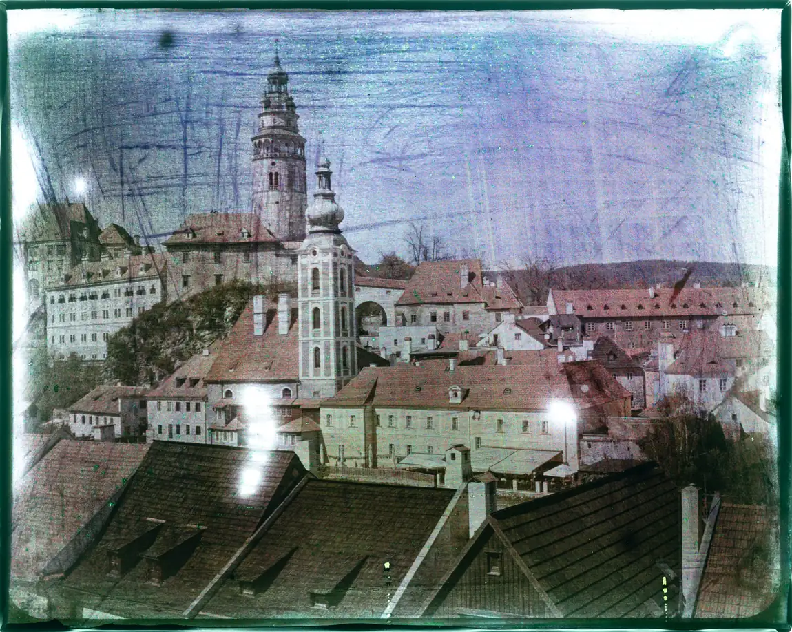 A reverse-processed Zebra Autochrome plate showing a town in colour